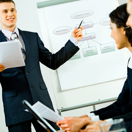 Portrait of business man demonstrating his project and talking